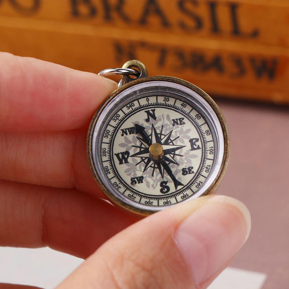 Goudkleurige navigatiehulpmidd - Compass Keychain Mini recensie en prijs